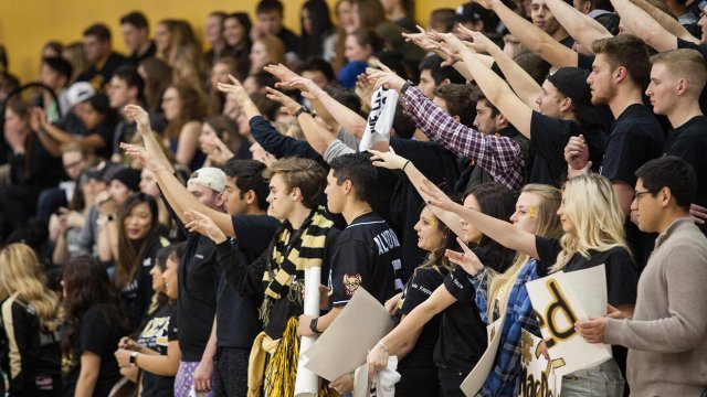 students watching a game at the Gallogly Events Center