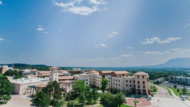 Summit Village student housing with mountains in the background