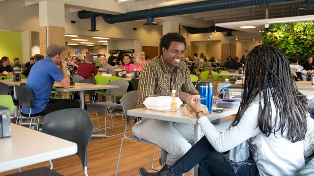 students relaxing and eating inside Cafe 65