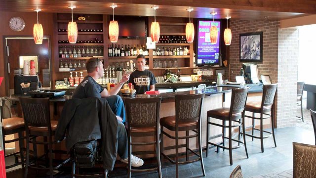 student eating at Clyde's Gastropub